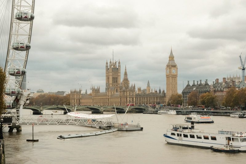 The London Eye and Big Ben are visible in this photograph of the River Thames in London, England.